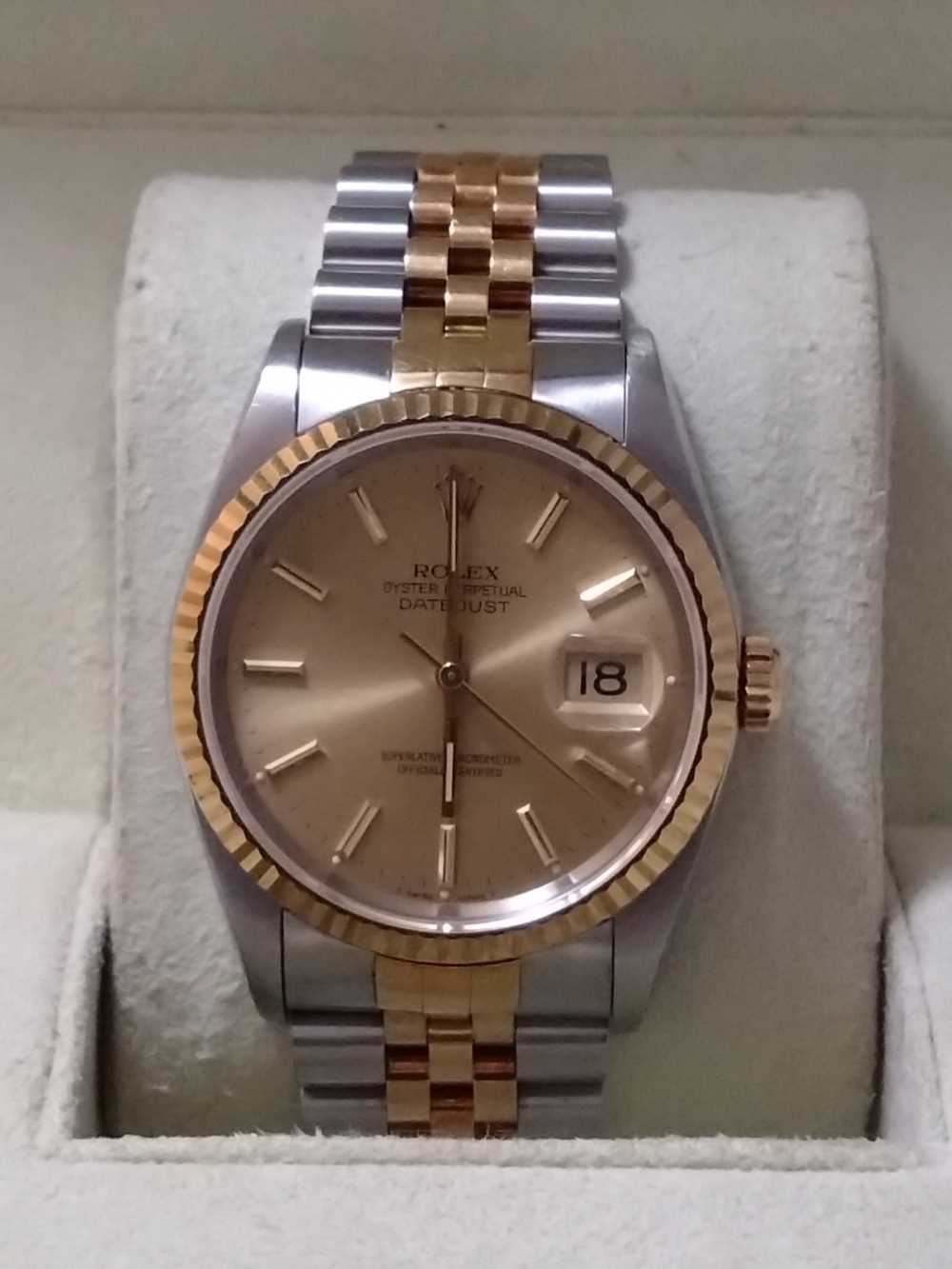 16233
